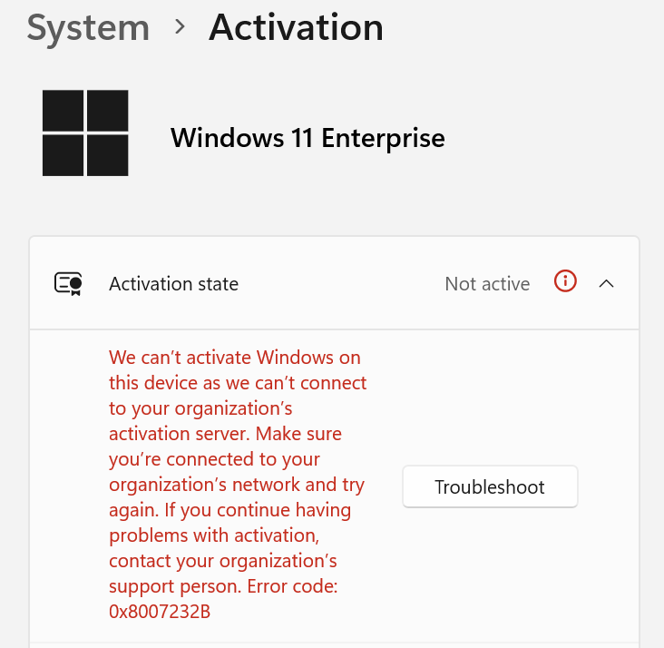 Snip of the user/client interface indicating Windows activation in an error state.